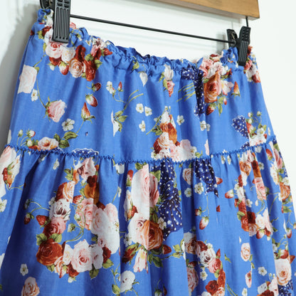 【極美品】ピンクハウス★リボンブーケpt♪ギャザースカート ブルー系 前開き 揺れるリボンいっぱい♪2025年 z22904