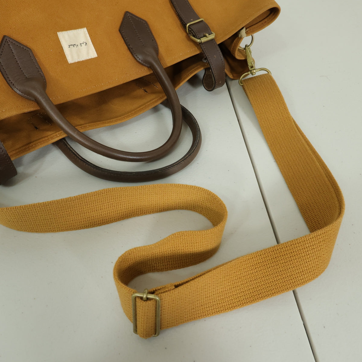 カールヘルム★旅行バッグ バックル ロゴタグ シンプル 大容量 茶系 ba299